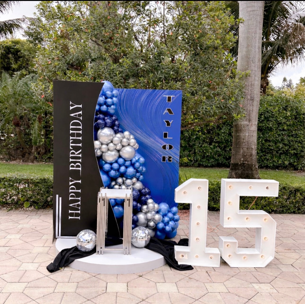 Blue quinceañera 15th birthday balloon decor with marquee numbers